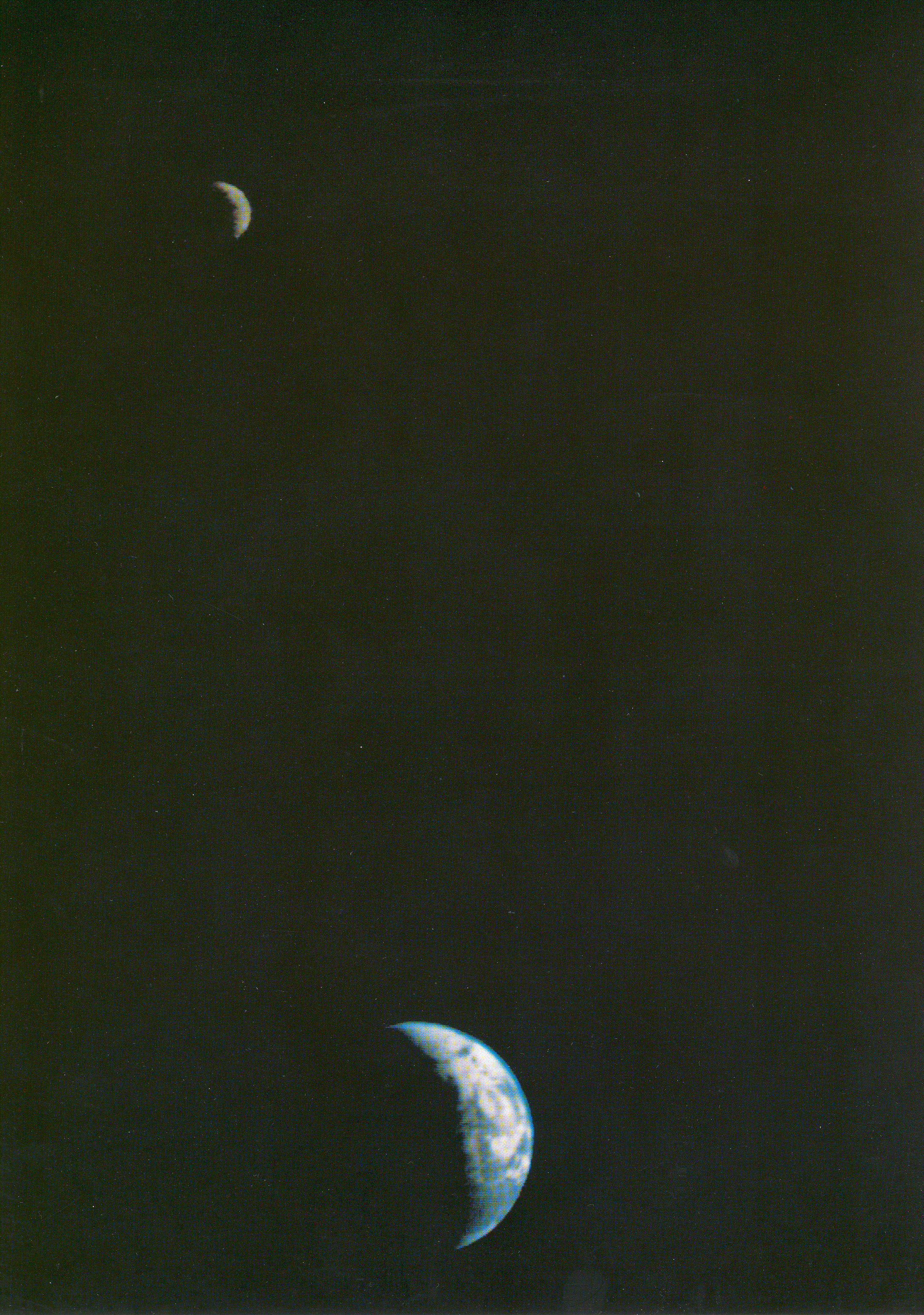The first image of the Earth-Moon system in a single photographic frame taken by Voyager 1 in 1977 as it departed on its journey to explore Jupiter, Saturn, and beyond