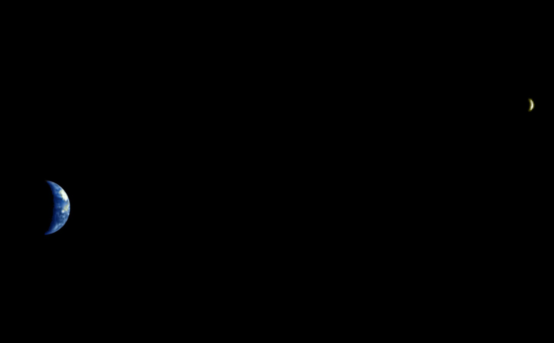 Earth and Moon photographed by the European Space Agency's Mars Express spacecraft in orbit around Mars in 2003