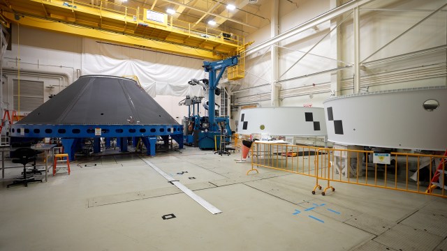 Key adapters for the first crewed Artemis missions are manufactured at NASA’s Marshall Space Flight Center in Huntsville, Alabama. The cone-shaped payload adapter, left, will debut on the Block 1B configuration of the SLS rocket beginning with Artemis IV, while the Orion stage adapters, right, will be used for Artemis II and Artemis III.
