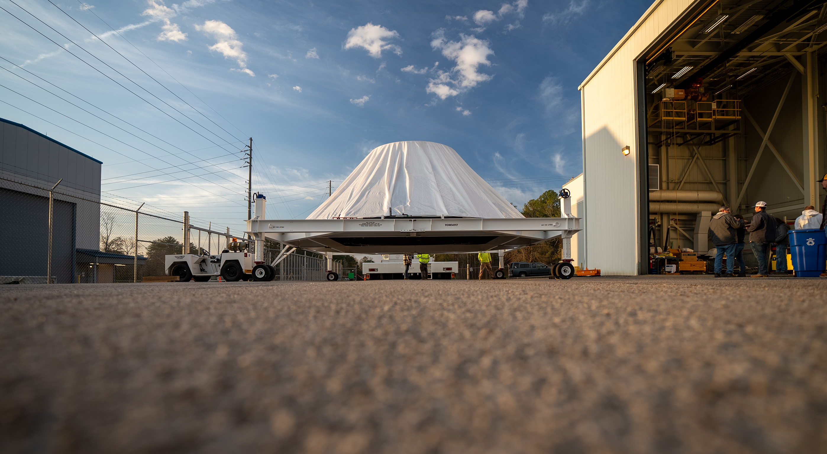 Teams at Marshall manufactured, prepared, and move the payload adapter test article. The payload adapter will undergo testing in the same test stand that once housed the SLS liquid oxygen tank structural test article.