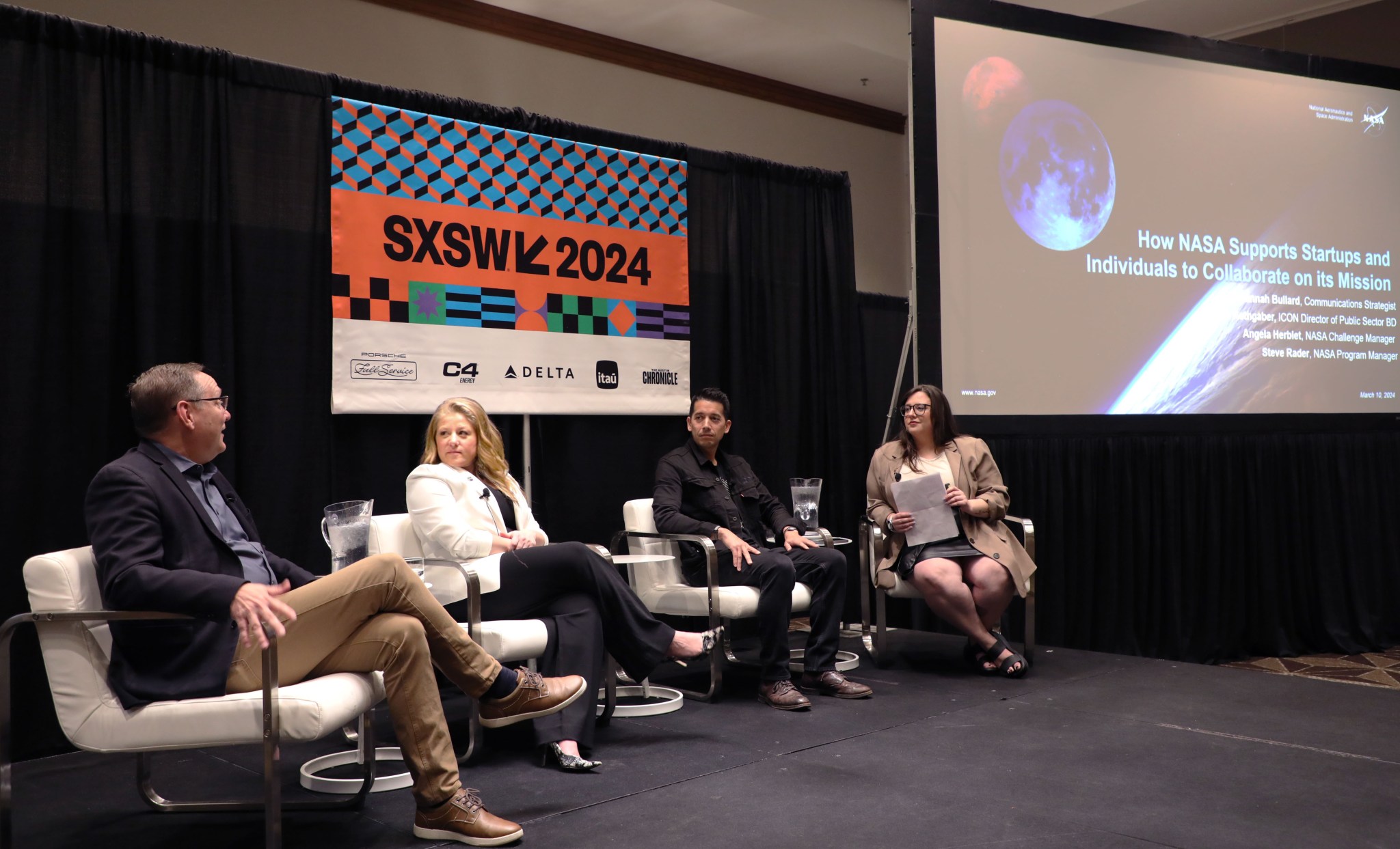 From left, panelists Steve Rader from NASA’s Johnson Space Center, Angela Herblet and Savannah Bullard from the agency’s Marshall Space Flight Center, and Andrew Rothgaber from ICON discuss the NASA’s Prizes, Challenges, and Crowdsourcing program at the South by Southwest Conference on March 10 in Austin, Texas.