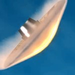 A space vehicle enters an blue-sky atmosphere with the underside of its conical aeroshell glowing with heat