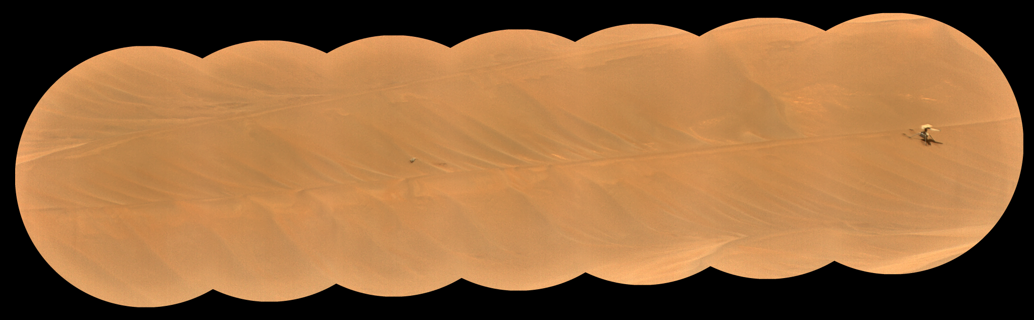 NASA's Ingenuity Mars Helicopter, right, stands near the apex of a sand ripple in an image taken by Perseverance on Feb. 24, about five weeks after the rotorcraft's final flight. Part of one of Ingenuity's rotor blades lies on the surface about 49 feet (15 meters) west of helicopter (left of center in the image).