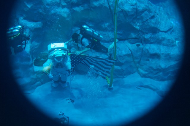Axiom Space's AxEMU (Axiom Extravehicular Mobility Unit) spacesuit underwater during testing of its pressure garment system at NASA Johnson's Neutral Buoyancy Laboratory.