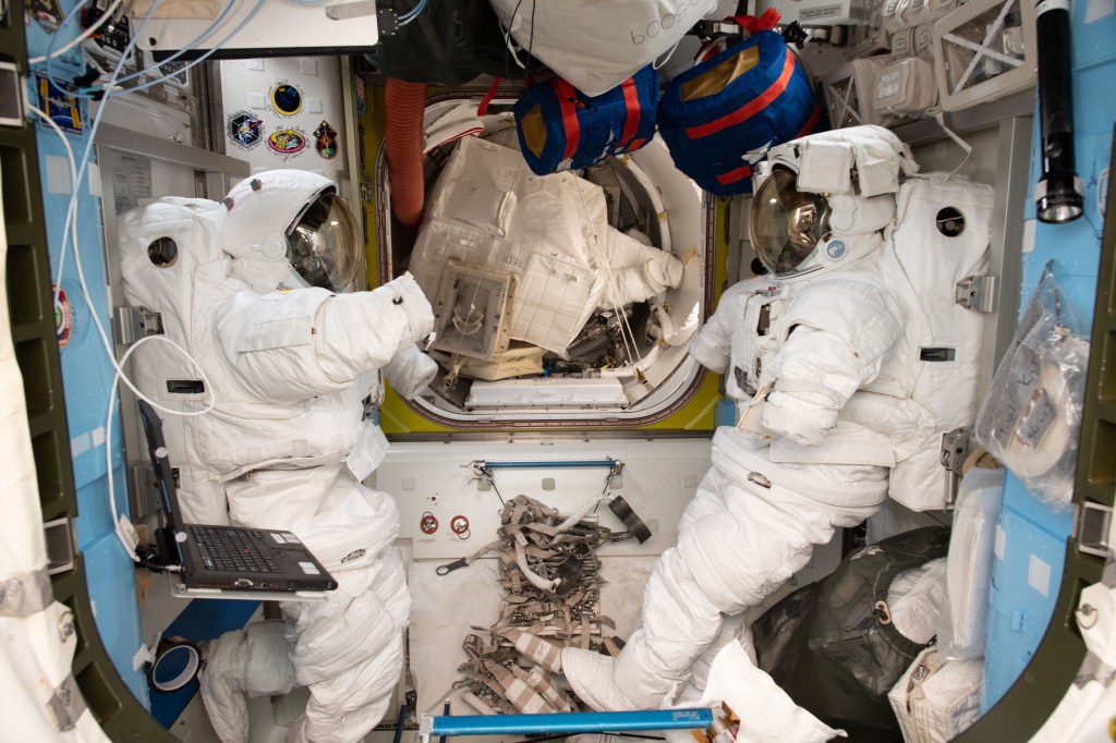 iss058e015351 (Feb. 17, 2019) --- A pair of spacesuits are pictured during servicing work inside the International Space Station's Quest airlock where U.S. spacewalks are staged.