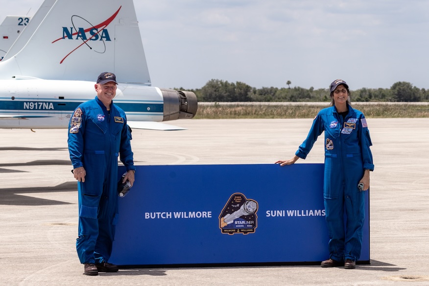 NASA astronauts Barry “Butch” E. Wilmore, left, and Sunita L. Williams arrive at NASA’s Kennedy Space Center in Florida to prepare for their launch
