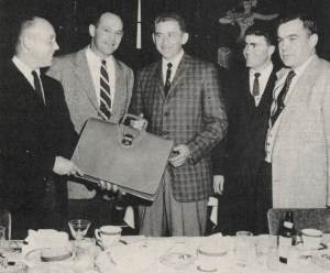 Five men in suits.