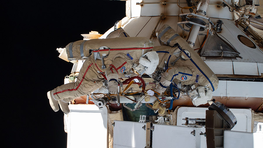 Cosmonauts Oleg Kononenko (left) and Nikolai Chub (right) are pictured during a spacewalk on Oct.25, 2023, working on the Nauka science module.