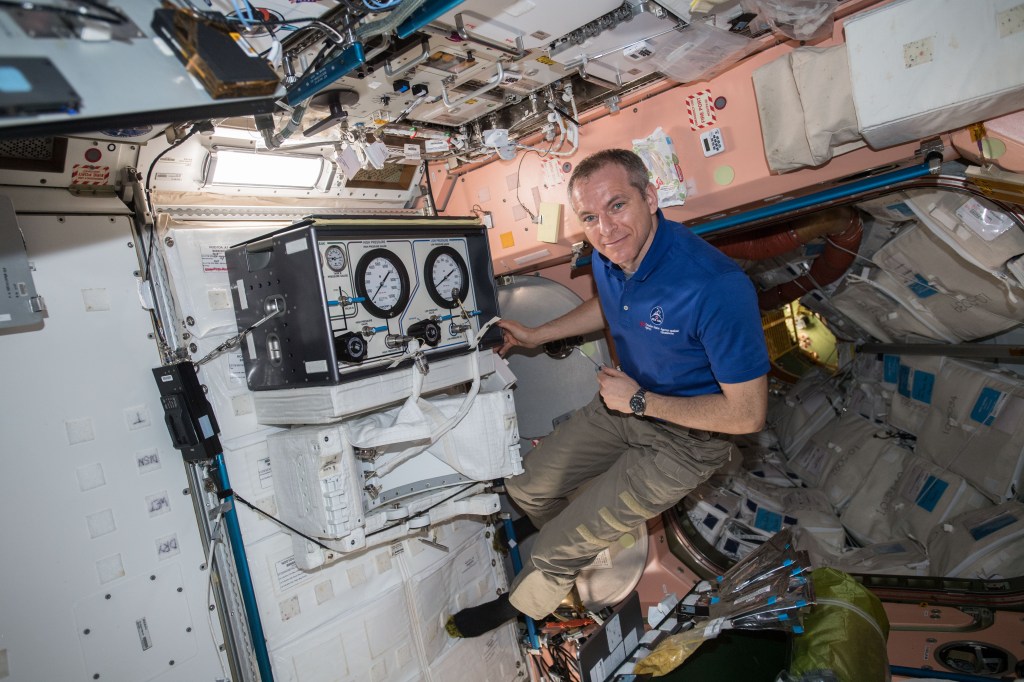 iss058e011232 (Feb. 8, 2019) --- Canadian Space Agency astronaut David Saint-Jacques works inside the Unity module performing preventative maintenance on the Simplified Aid For EVA Rescue (SAFER) unit that attaches to U.S. spacesuits. The SAFER would be used to maneuver an astronaut back to the International Space Station in the unlikely event they became untethered during a spacewalk.