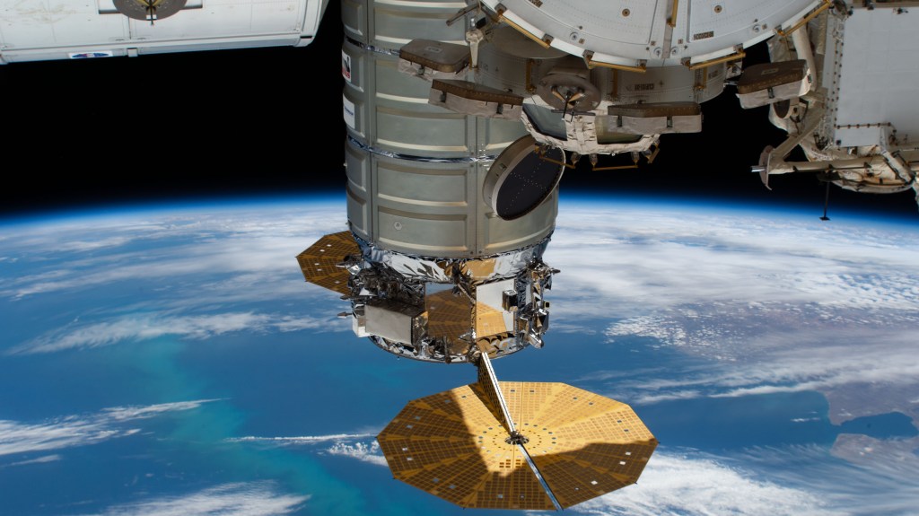 iss058e002245 (Jan. 7, 2019) --- The U.S. Cygnus space freighter from Northrop Grumman and its prominent cymbal-shaped UltraFlex solar arrays are pictured as the International Space Station orbited 262 miles above the Atlantic Ocean off the coast of Argentina. Towards the top center of the photograph is the seven-windowed cupola with its shutters open.