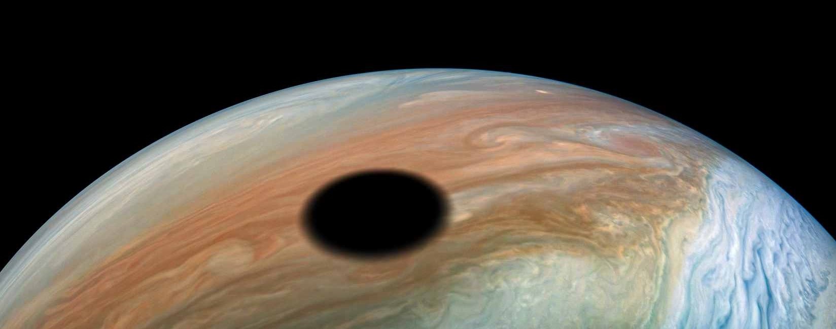 Juno image of Io’s shadow on Jupiter in September 2019