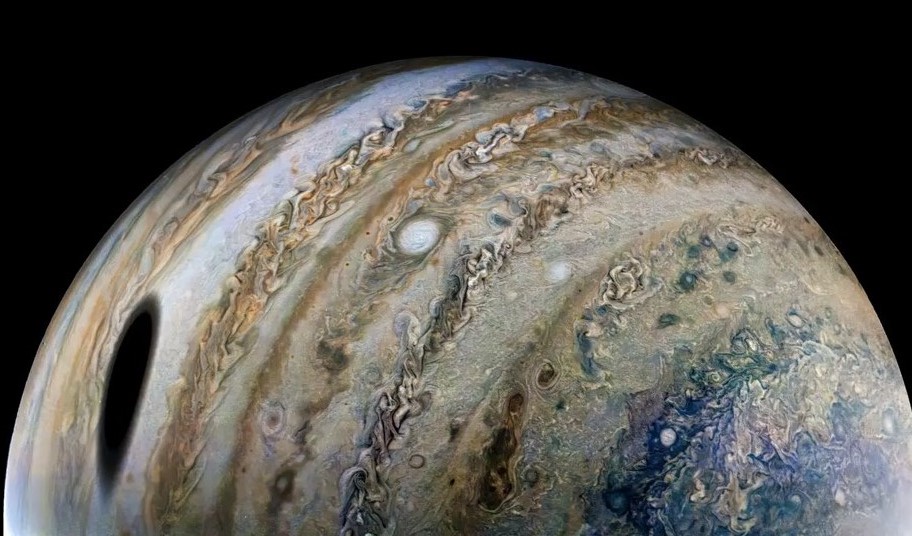 Juno image of Jupiter’s moon Ganymede casting its shadow on the planet in February 2022