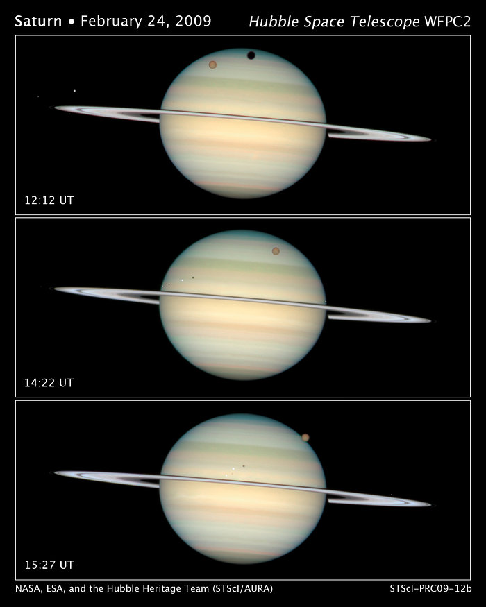 Sequential Hubble Space Telescope February 2009 images of a quadruple eclipse, as Saturn’s moons Enceladus, Dione, Titan, and Mimas cast their shadows on the planet