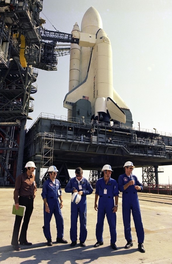 Astronaut support engineer Richard W. Nygren stands at Launch Pad 39A with astronauts Richard H. Truly, John W. Young, Robert L. Crippen, and Joe H. Engle, the prime and backup crews assigned to the first space shuttle mission