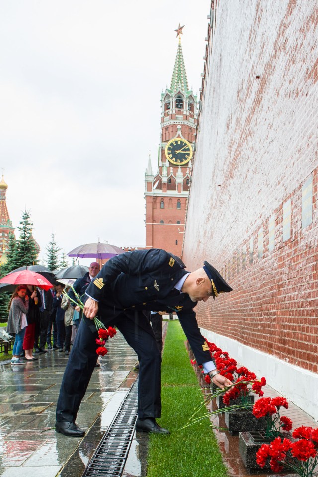 jsc2019e036806 (June 28, 2019) --- At Red Square in Moscow, Expedition 60 crewmember Luca Parmitano of the European Space Agency lays flowers at the Kremlin Wall June 28 where Russian space icons are interred in traditional pre-launch activities. Parmitano, Alexander Skvortsov of Roscosmos and Drew Morgan of NASA will launch July 20 on the Soyuz MS-13 spacecraft from the Baikonur Cosmodrome in Kazakhstan for a mission on the International Space Station. Credit: Andrey Shelepin/GCTC