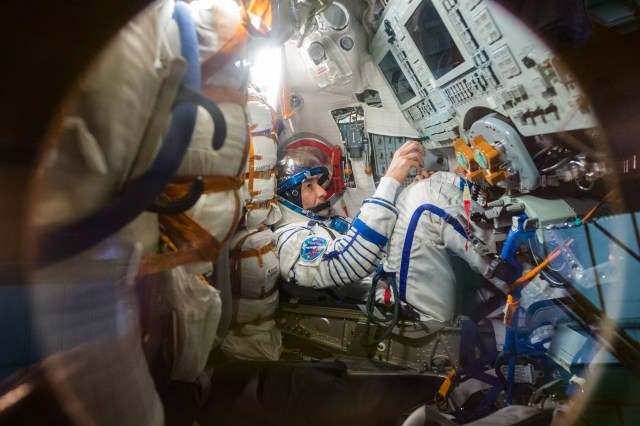 jsc2019e038384 (July 5, 2019) --- At the Baikonur Cosmodrome in Kazakhstan, Expedition 60 crewmember Luca Parmitano of the European Space Agency works procedures inside his Soyuz spacecraft July 5 as part of pre-launch activities.Parmitano, Drew Morgan of NASA and Alexander Skvortsov of Roscosmos will launch July 20 on the Soyuz MS-13 spacecraft from the Baikonur Cosmodrome for a mission on the International Space Station. Credit: Andrey Shelepin/GCTC