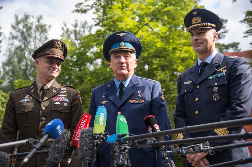 jsc2019e038374 (July 4, 2019) --- At the Gagarin Cosmonaut Training Center in Star City, Russia, Expedition 60 crewmembers Drew Morgan of NASA (left), Alexander Skvortsov of Roscosmos (center) and Luca Parmitano of the European Space Agency (right) answer reporters’ questions July 4 before departing for their launch site in Kazakhstan. They will launch July 20 from the Baikonur Cosmodrome in Kazakhstan on the Soyuz MS-13 spacecraft for a mission on the International Space Station. Credit: NASA/Beth Weissinger