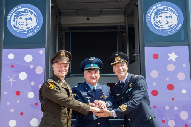jsc2019e038369 (July 4, 2019) --- At the Baikonur Cosmodrome in Kazakhstan, Expedition 60 crewmembers Drew Morgan of NASA (left), Alexander Skvortsov of Roscosmos (center) and Luca Parmitano of the European Space Agency (right) pose for pictures July 4 after a flight from their training base outside Moscow for final pre-launch preparations. They will launch July 20 from the Baikonur Cosmodrome in Kazakhstan on the Soyuz MS-13 spacecraft for a mission on the International Space Station. Credit: Andrey Shelepin/GCTC