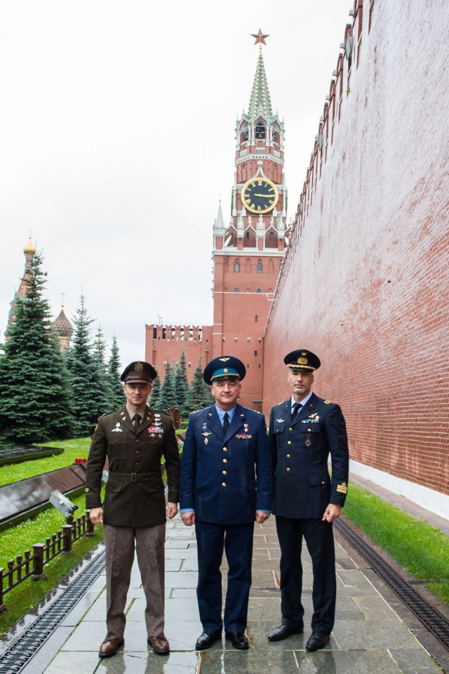 At the Kremlin Wall at Red Square in Moscow, Expedition 60 crewmembers Drew Morgan of NASA (left), Alexander Skvortsov of Roscosmos (center) ad Luca Parmitano of the European Space Agency (right) pose for pictures June 28 during a traditional pre-launch visit. They will launch July 20 on the Soyuz MS-13 spacecraft from the Baikonur Cosmodrome in Kazakhstan for a mission on the International Space Station. Andrey Shelepin/GCTC