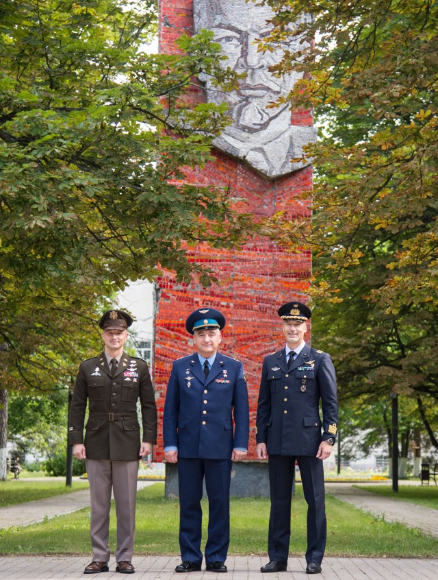 At the Gagarin Cosmonaut Training Center in Star City, Russia, the mural of Vladimir Lenin serves as a backdrop as Expedition 60 crewmembers Drew Morgan of NASA (left), Alexander Skvortsov of Roscosmos (center) and Luca Parmitano of the European Space Agency (right) pose for pictures July 4 before departing for their launch site in Kazakhstan. They will launch July 20 from the Baikonur Cosmodrome in Kazakhstan on the Soyuz MS-13 spacecraft for a mission on the International Space Station. NASA/Beth Weissinger