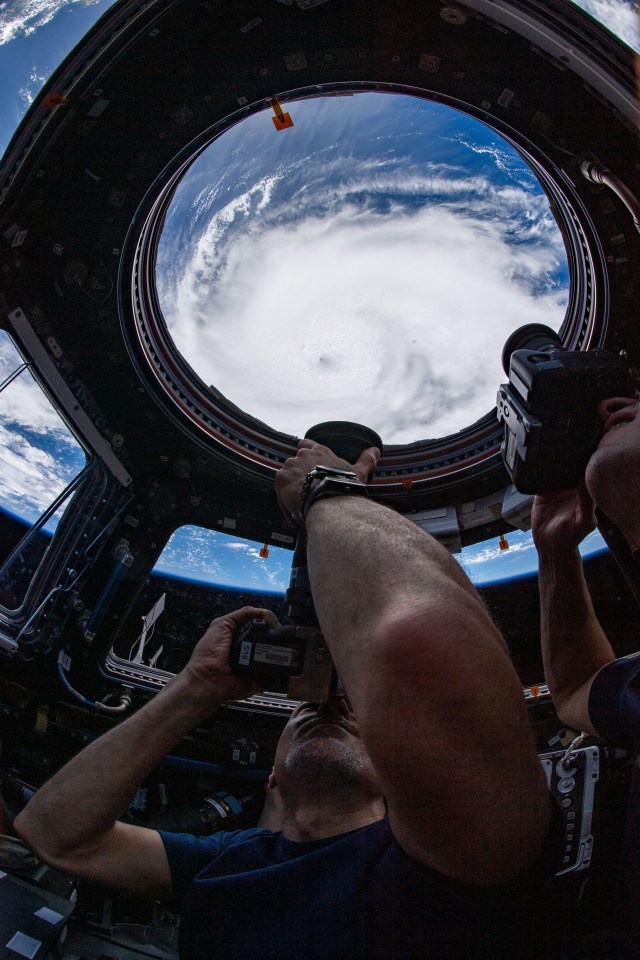 iss060e047724 -- Expedition 60 crewmembers take turns capturing images of rapidly intensifying Hurricane Dorian from the cupola inside the International Space Station on Aug. 30 as it churned over the Atlantic Ocean.