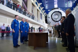 jsc2019e035254 (June 26, 2019) --- At the Gagarin Cosmonaut Training Center in Star City, Russia, Expedition 60 crewmembers Drew Morgan of NASA (left), Alexander Skvortsov of Roscosmos (center) and Luca Parmitano of the European Space Agency (right) report for their final qualification exams June 26. They will launch July 20 on the Soyuz MS-13 spacecraft from the Baikonur Cosmodrome in Kazakhstan for a mission on the International Space Station. Credit: NASA/Beth Weissinger