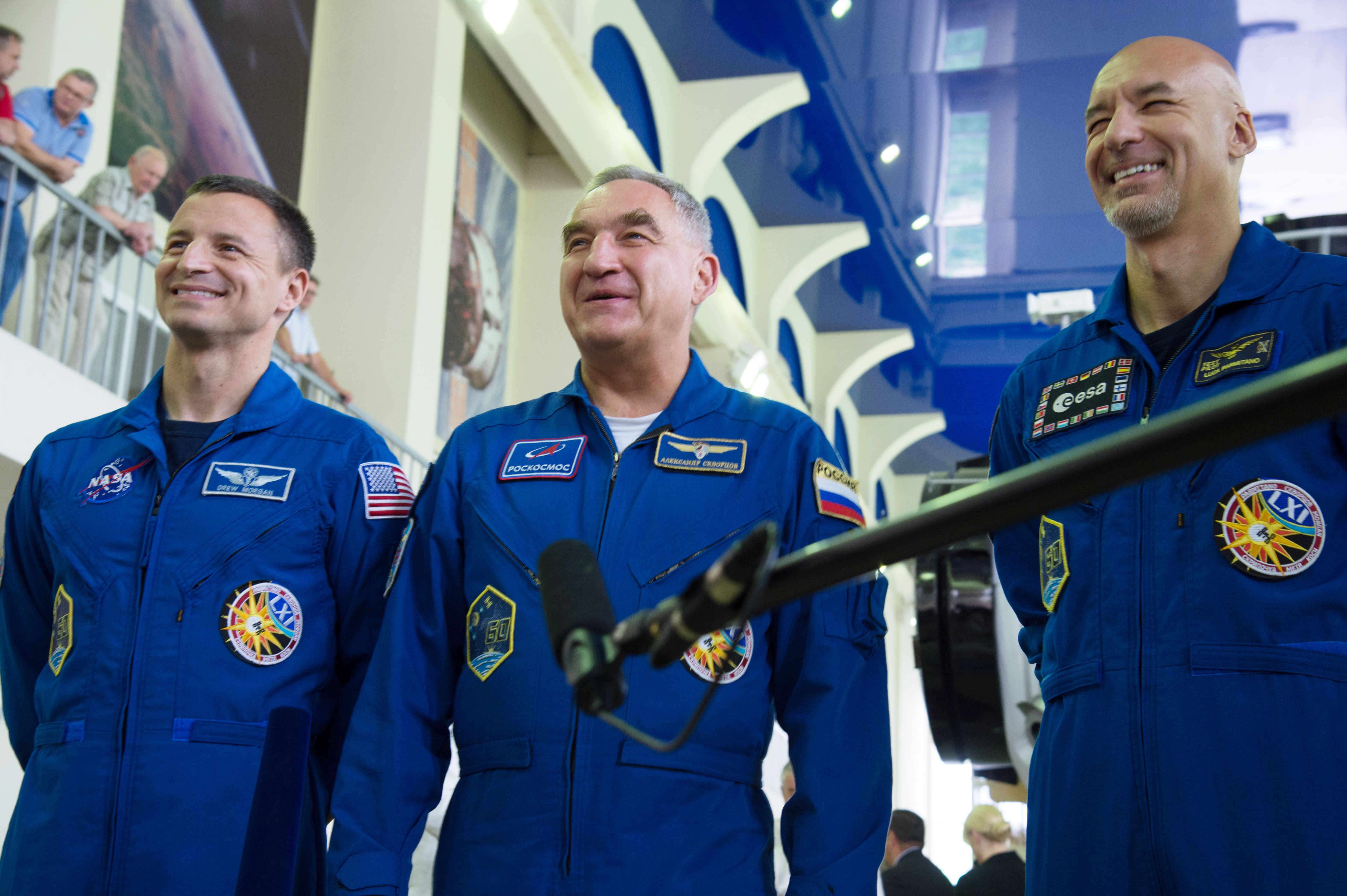 jsc2019e035259 (June 26, 2019) --- At the Gagarin Cosmonaut Training Center in Star City, Russia, Expedition 60 crewmembers Drew Morgan of NASA (left), Alexander Skvortsov of Roscosmos (center) and Luca Parmitano of the European Space Agency (right) respond to reporters' questions June 26 during final qualification exams. They will launch July 20 on the Soyuz MS-13 spacecraft from the Baikonur Cosmodrome in Kazakhstan for a mission on the International Space Station. Credit: NASA/Beth Weissinger
