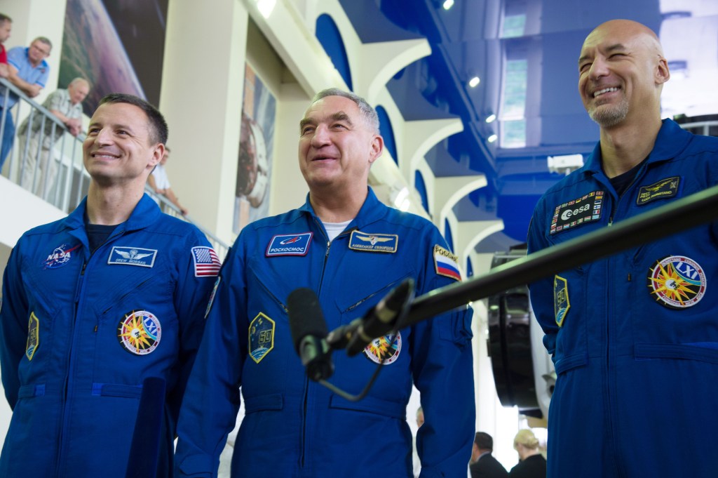 jsc2019e035259 (June 26, 2019) --- At the Gagarin Cosmonaut Training Center in Star City, Russia, Expedition 60 crewmembers Drew Morgan of NASA (left), Alexander Skvortsov of Roscosmos (center) and Luca Parmitano of the European Space Agency (right) respond to reporters' questions June 26 during final qualification exams. They will launch July 20 on the Soyuz MS-13 spacecraft from the Baikonur Cosmodrome in Kazakhstan for a mission on the International Space Station. Credit: NASA/Beth Weissinger