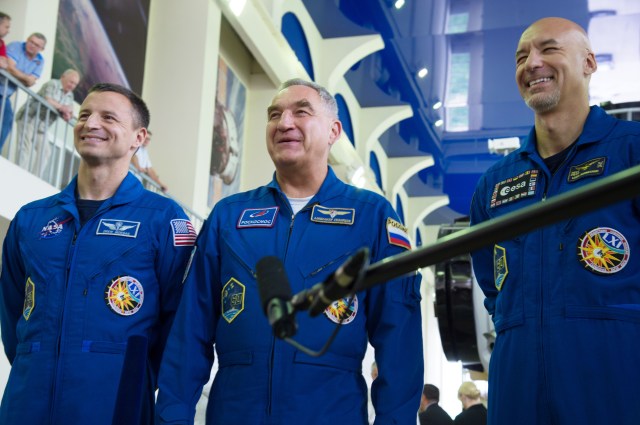 jsc2019e035259 (June 26, 2019) --- At the Gagarin Cosmonaut Training Center in Star City, Russia, Expedition 60 crewmembers Drew Morgan of NASA (left), Alexander Skvortsov of Roscosmos (center) and Luca Parmitano of the European Space Agency (right) respond to reporters' questions June 26 during final qualification exams. They will launch July 20 on the Soyuz MS-13 spacecraft from the Baikonur Cosmodrome in Kazakhstan for a mission on the International Space Station. Credit: NASA/Beth Weissinger