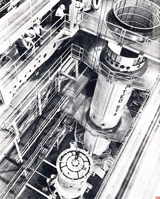 Workers at Martin Marietta’s Baltimore facility test Gemini 1’s Titan II rocket