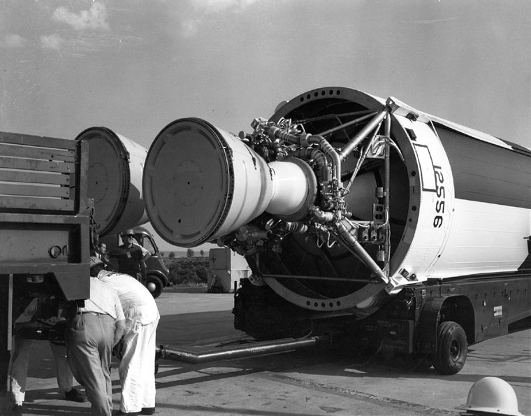 The first stage of Gemini 1’s Titan II rocket arrives at Cape Canaveral’s Launch Pad 19