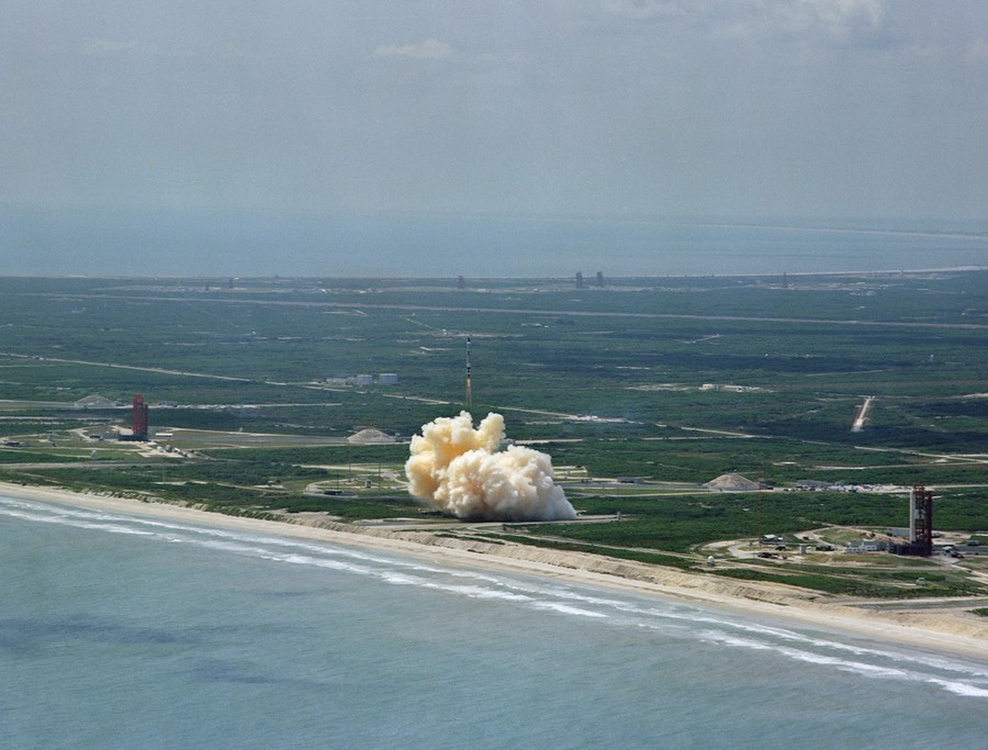 Aerial view of Gemini 1 rising from Launch Pad 19