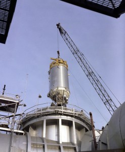 Rocket stage lowered into chamber.