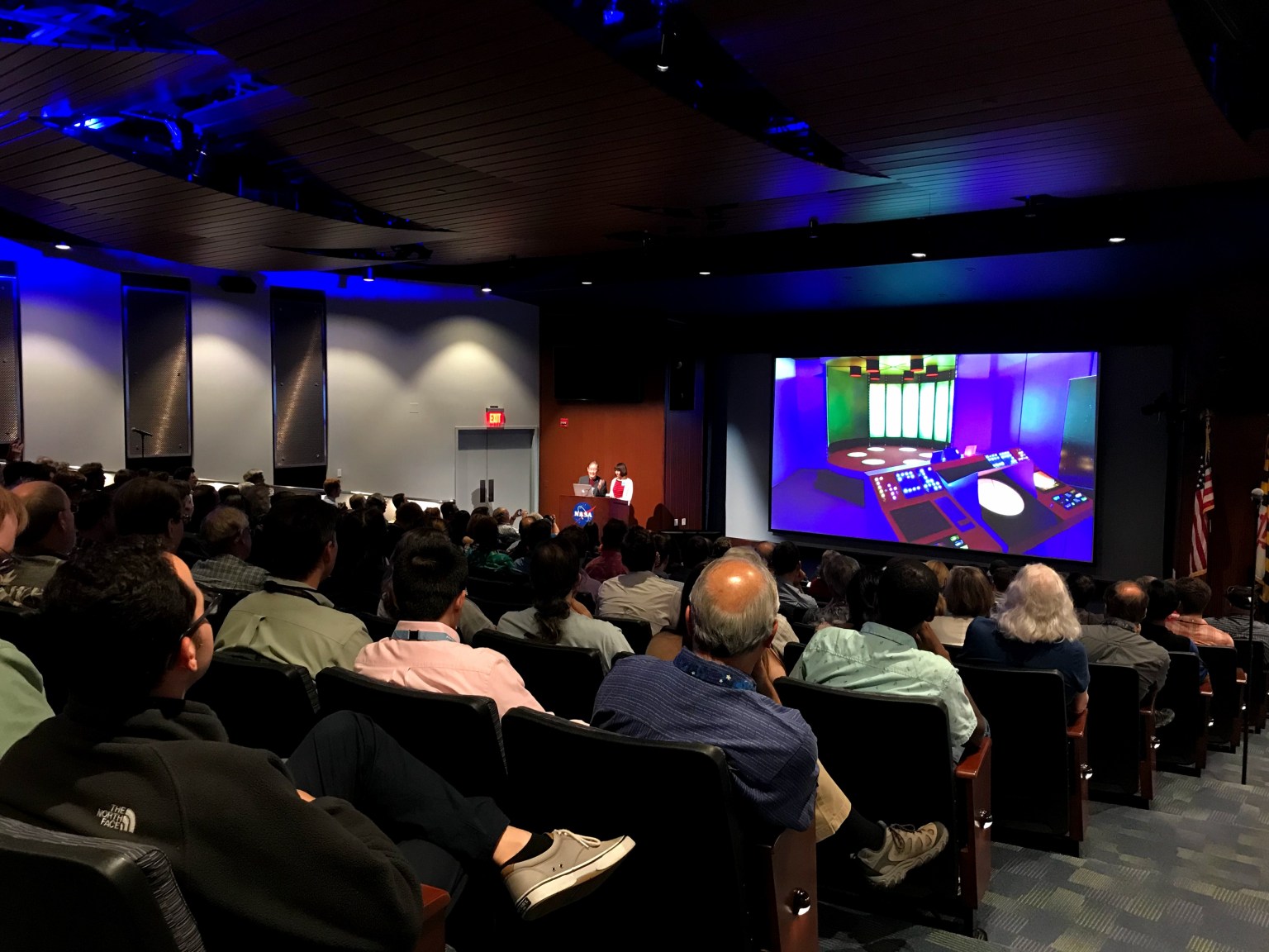 a crowd in an auditorium