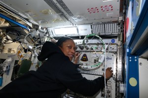 Expedition 70 Flight Engineer and NASA astronaut Jeanette Epps installs the Advanced Space Experiment Processor-2, or ADSEP-2. The scientific device can interface with the Dragon and Cygnus cargo craft and houses cassettes that process samples for biology and physics research including cell and tissue culturing, protein crystal growth, microorganism and bacteria studies, and materials science research.