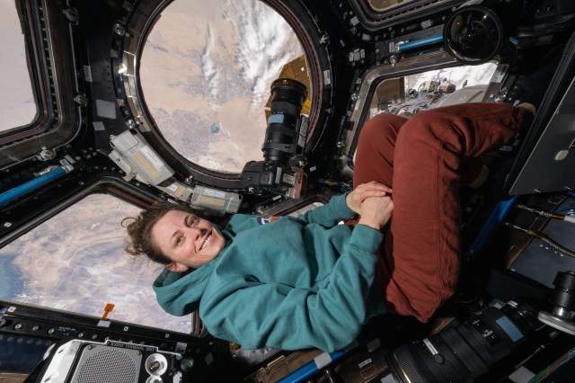 Expedition 70 Flght Engineer and NASA astronaut Loral O'Hara is pictured inside the cupola, the International Space Station's "window to the world," as the orbital complex soared 259 miles above Turkmenistan.
