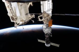 The Soyuz MS-25 spacecraft is pictured docked to the Prichal docking module as the International Space Station soared into an orbital sunset 260 miles above the Indian Ocean off the coast on Indonesia.