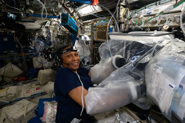Expedition 71 Flight Engineer and NASA astronaut Jeanette Epps works in the BioFabrication Facility portable glovebag located in the International Space Station's Columbus laboratory module. She was working on the Redwire Cardiac Bioprinting Investigation that may offer the ability to print food and medicines for future space crews. Results may also enable the bioprinting of replacement organs and tissues potentially alleviating the shortage of donor organs on Earth.