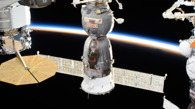 The Soyuz MS-24 spacecraft is pictured docked to the International Space Station's Rassvet module as it soared into an orbital sunset 260 miles above the Pacific Ocean off the coast of Costa Rica. Aboard the Soyuz crew ship and waiting to undock from Rassvet for the ride back to Earth were NASA astronaut Loral O'Hara, Roscosmos cosmonaut Oleg Novitskiy, and Belarus spaceflight participant Marina Vasilevskaya.