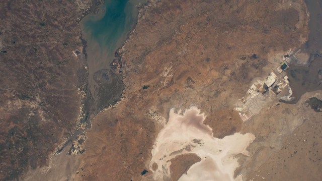India's Gulf of Kutch (top left) and the Rann of Kutch (bottom right), an area of grassland and deserts, in the state of Gujarat are pictured from the International Space Station as it orbited 258 miles above.