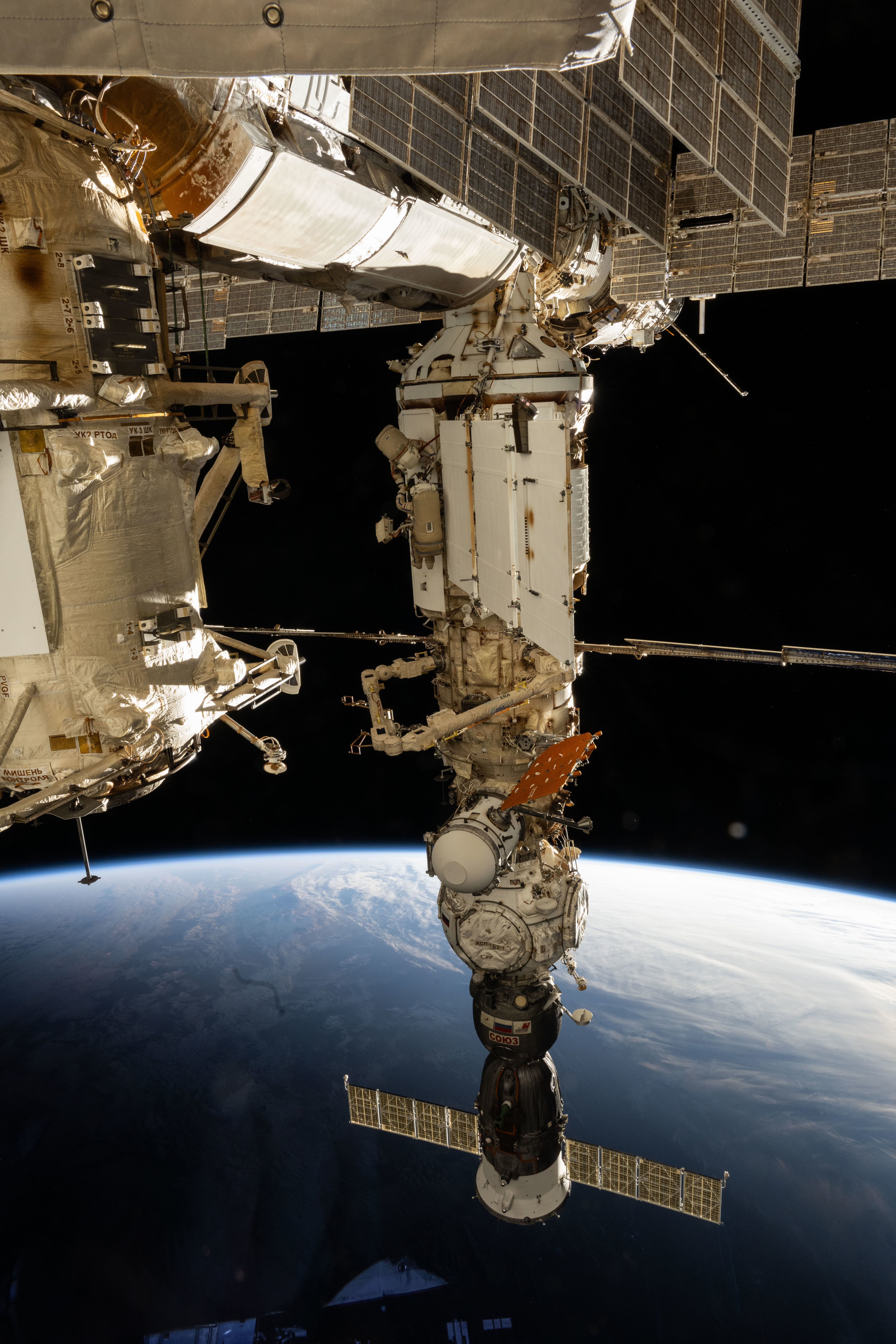 Cosmonauts (near center) Nikolai Chub and Oleg Kononenko are pictured outside of the International Space Station's Nauka science module wearing their Orlan spacesuits during a four-hour and 36-minute spacewalk. The spacewalkers worked on the Russian segment of the complex completing the deployment of one panel on a synthetic radar communications system. The duo also installed equipment and experiments to analyze the level of corrosion on station surfaces and modules. The space station was soaring into an orbital sunset 270 miles above the Indian Ocean south of Africa.
