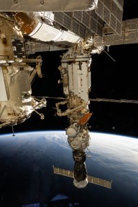 Cosmonauts (near center) Nikolai Chub and Oleg Kononenko are pictured outside of the International Space Station's Nauka science module wearing their Orlan spacesuits during a four-hour and 36-minute spacewalk. The spacewalkers worked on the Russian segment of the complex completing the deployment of one panel on a synthetic radar communications system. The duo also installed equipment and experiments to analyze the level of corrosion on station surfaces and modules. The space station was soaring into an orbital sunset 270 miles above the Indian Ocean south of Africa.