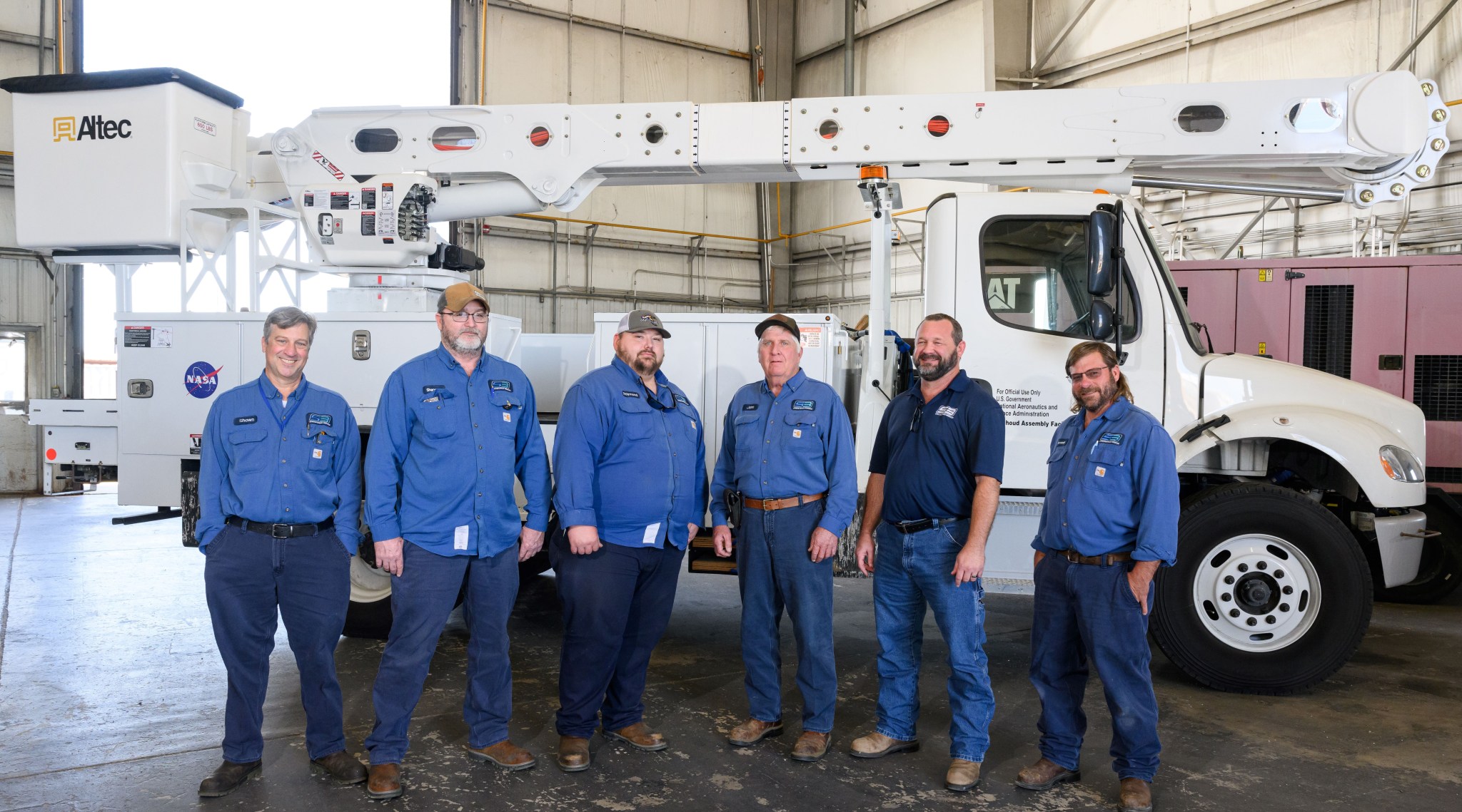 The High Voltage Hurricane Ida Site Recovery Team at NASA’s Michoud Assembly Facility was awarded the agency’s Silver Group Achievement Award on March 18. From left are Shawn Frederick, Shannon Pippen, Raymond Lusich, John Barnett, Joseph Noble, and Dominick Bertucci. Not pictured: Ngoc Nguyen.