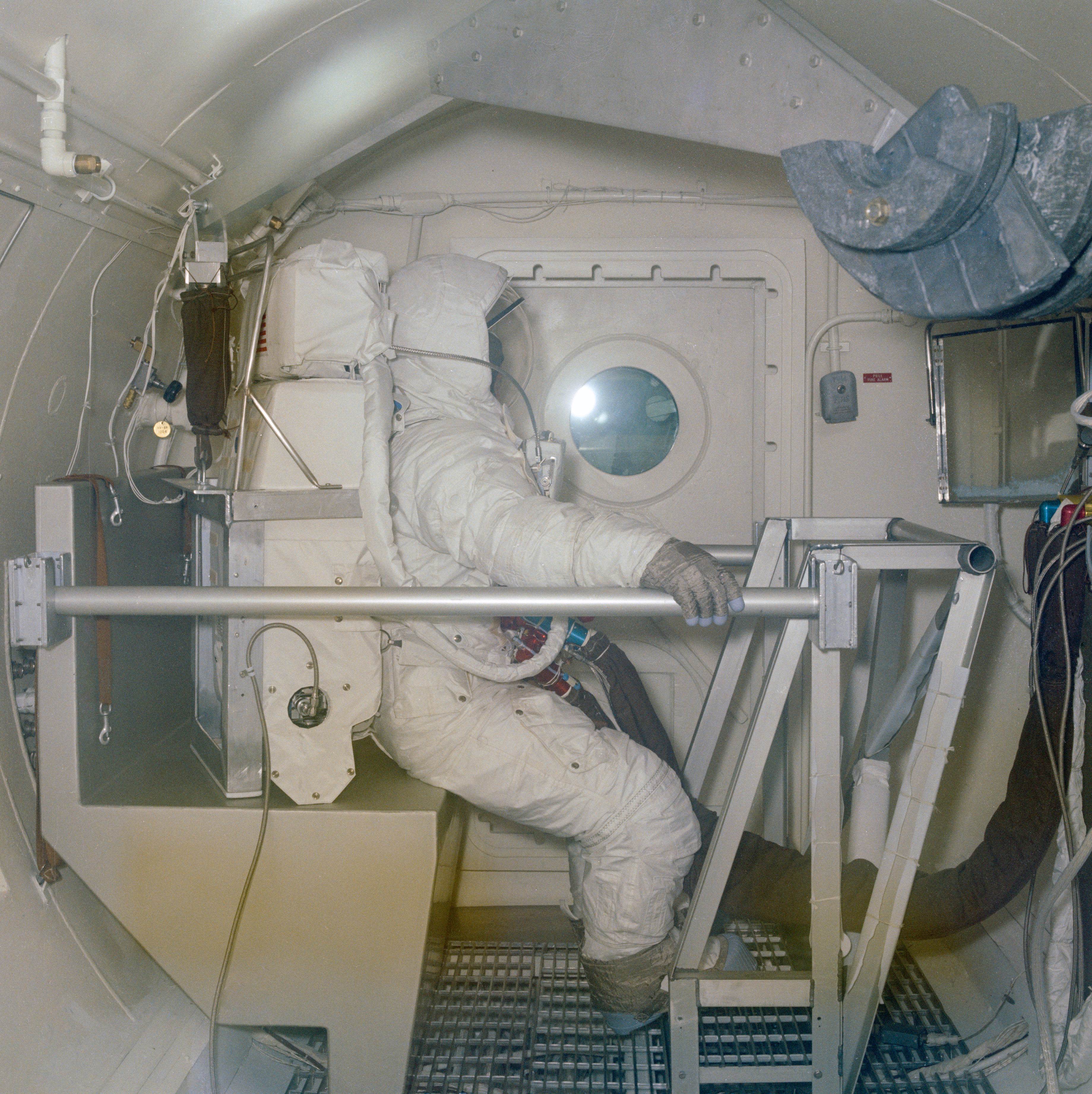 Apollo 11 astronaut Edwin E. “Buzz” Aldrin tests his spacesuit in a vacuum chamber