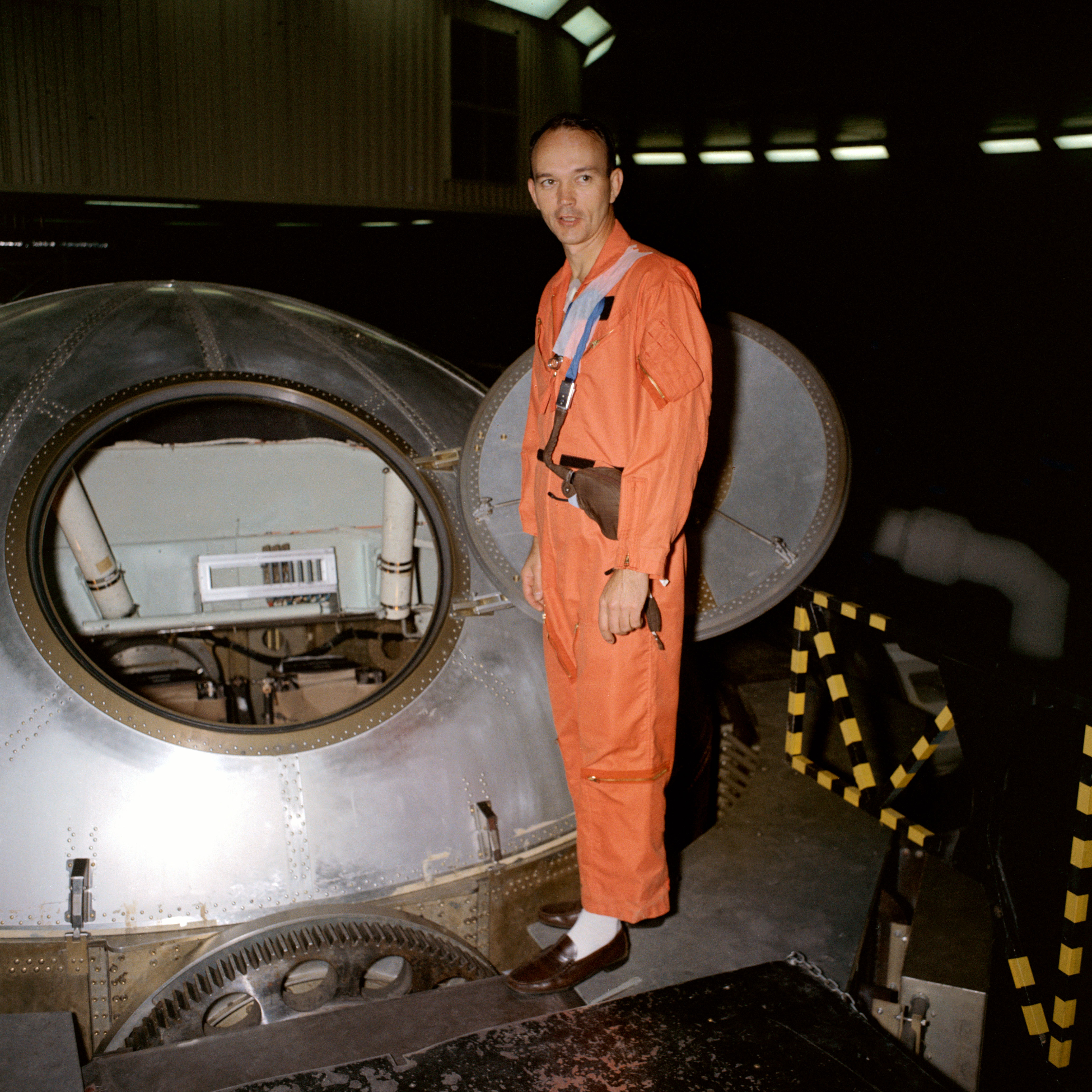 Michael Collins prepares to enter the centrifuge gondola