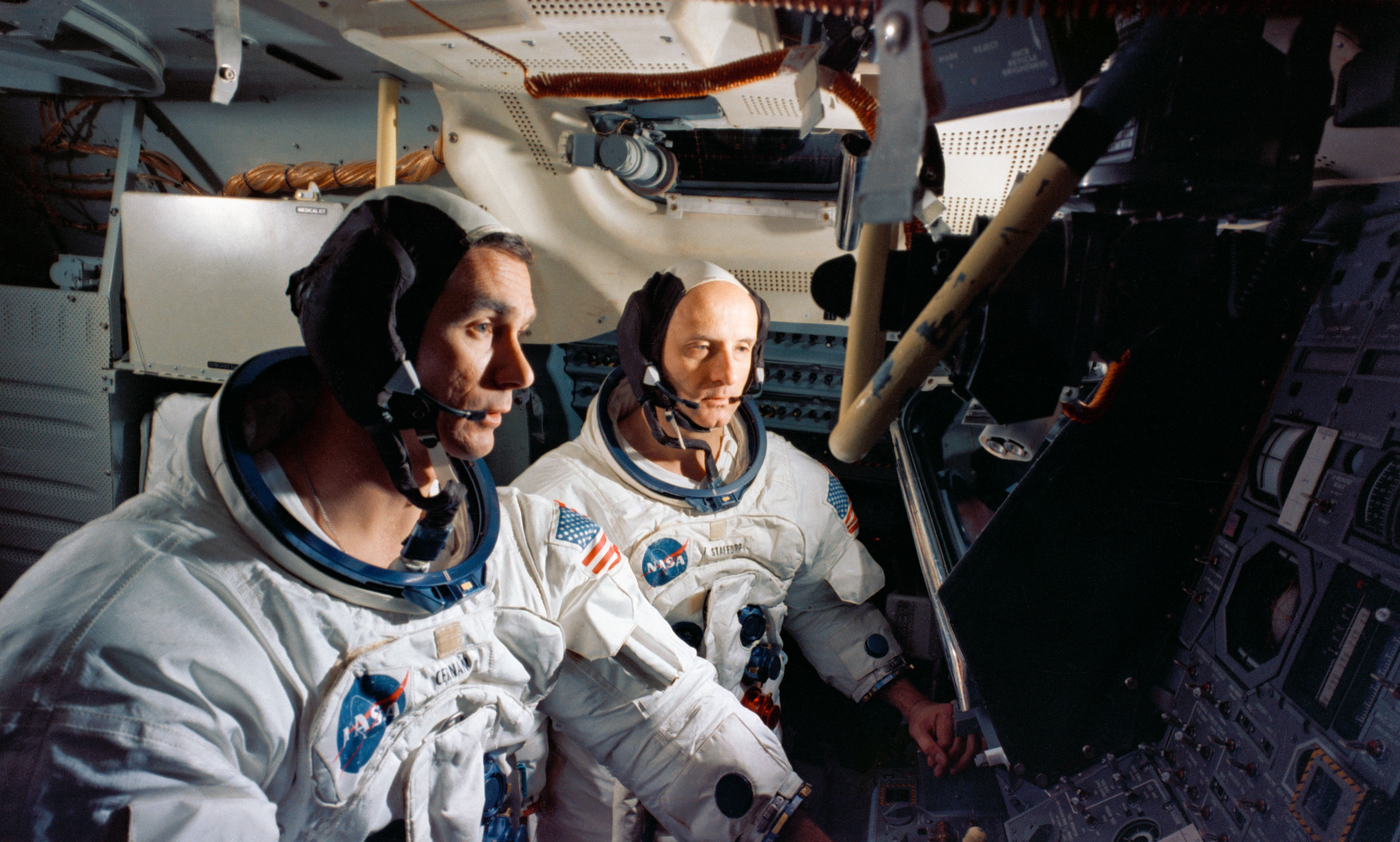 Apollo 10 astronauts Eugene A. Cernan, left, and Thomas P. Stafford in the Lunar Module simulator