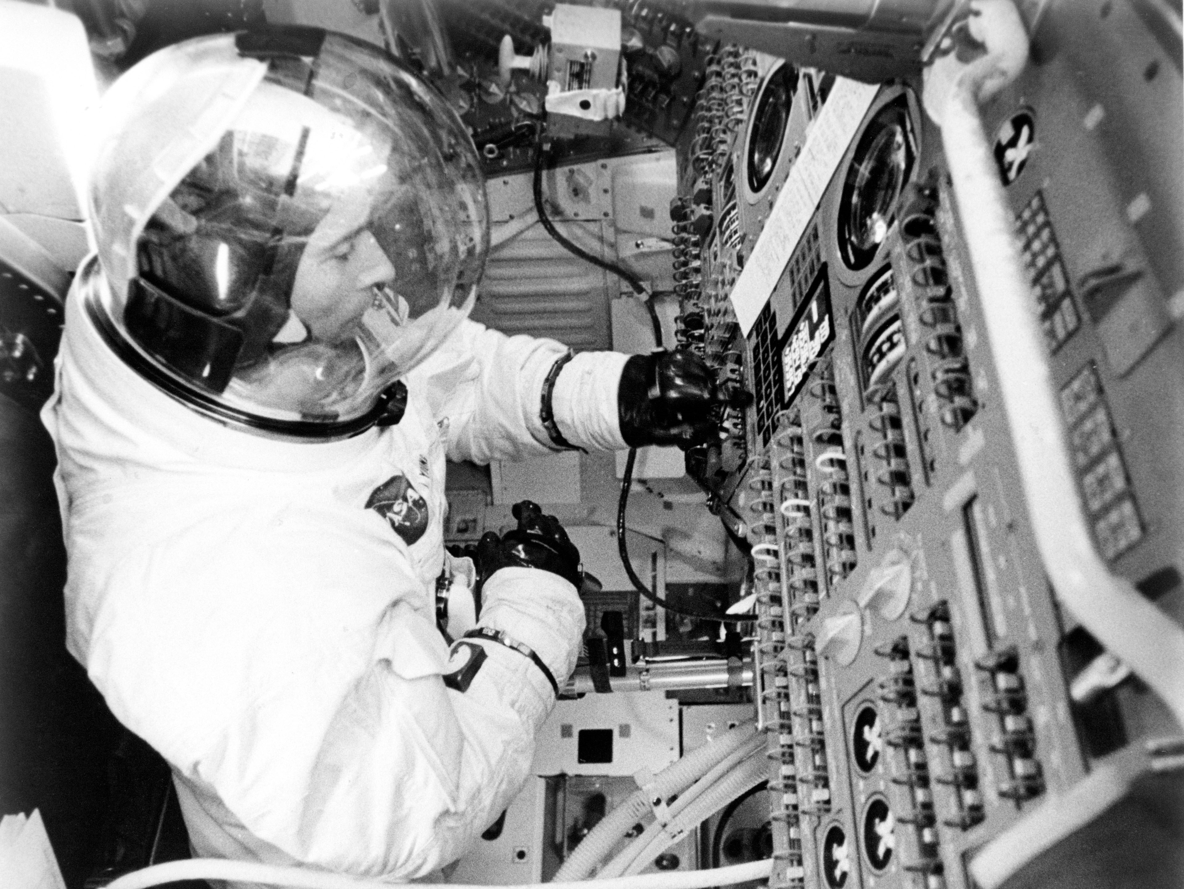 Apollo 10 astronaut John W. Young in the Command Module simulator