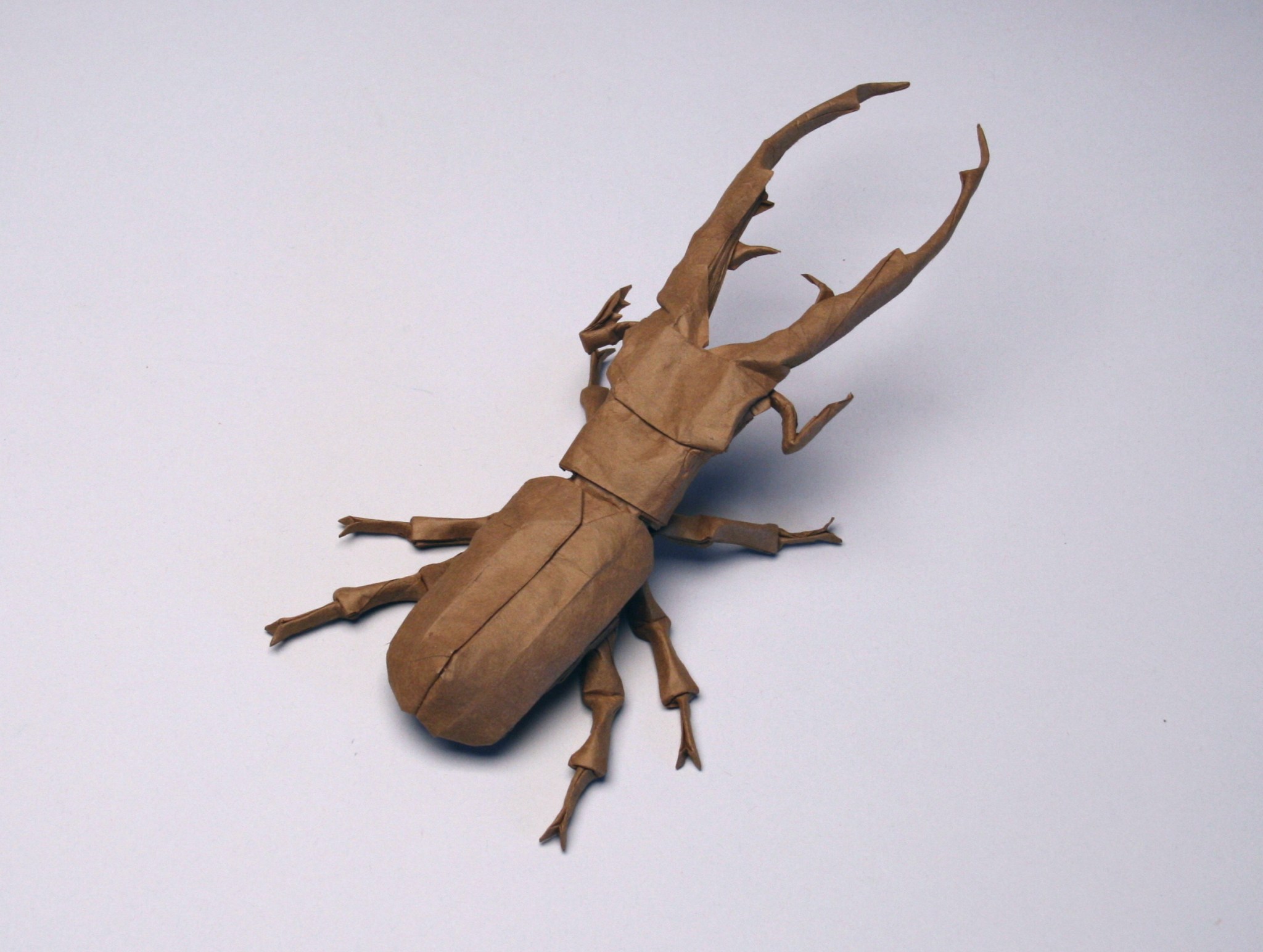 An origami depiction of a Stag Beetle
