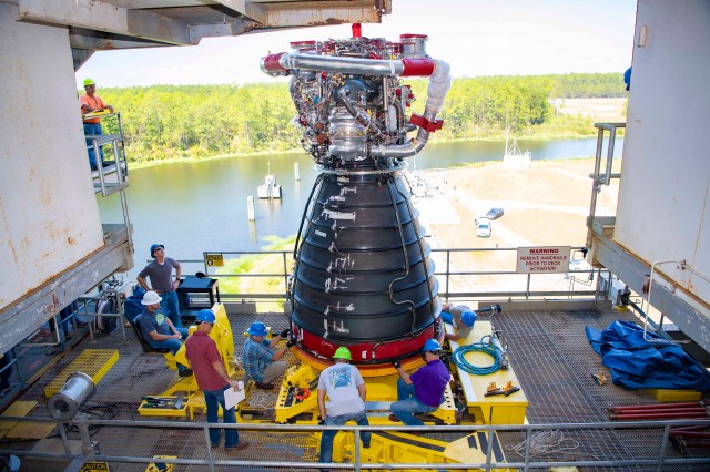 Team members ready RS-25 engine E0525 for full installation