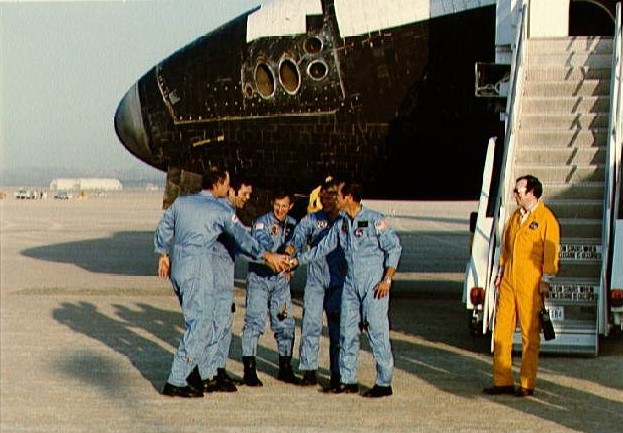 STS-41C astronauts congratulate themselves on a successful flight